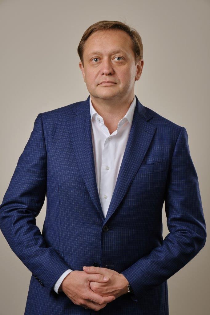 Олег Белай, деловой портрет